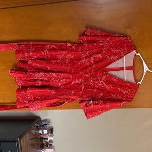 Red/orange floral V-Neck Short Sleeve Wrap romper.